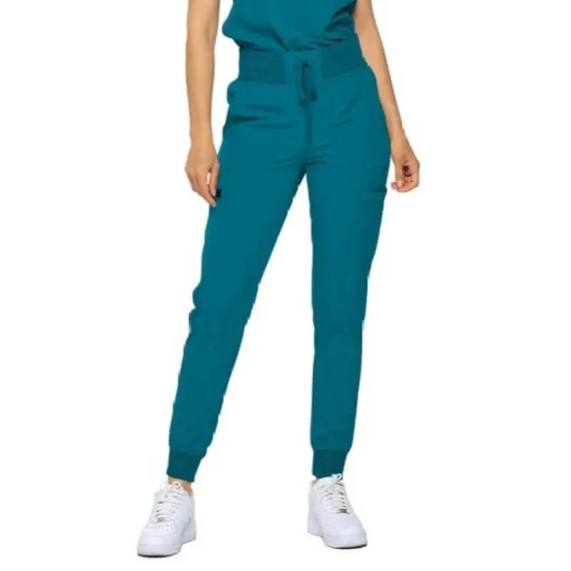 Wholesale women's teal jogger pants with drawstring waist and white sneakers