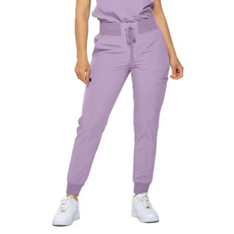 Wholesale women's lavender cargo joggers with drawstring waist and white sneakers