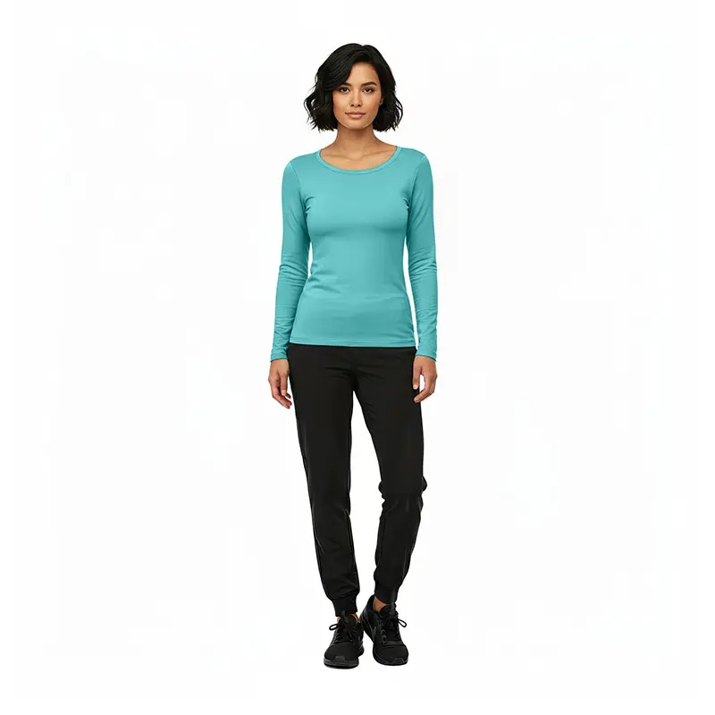 Wholesale women's turquoise long sleeve crew neck top with black jogger pants and black lace-up shoes