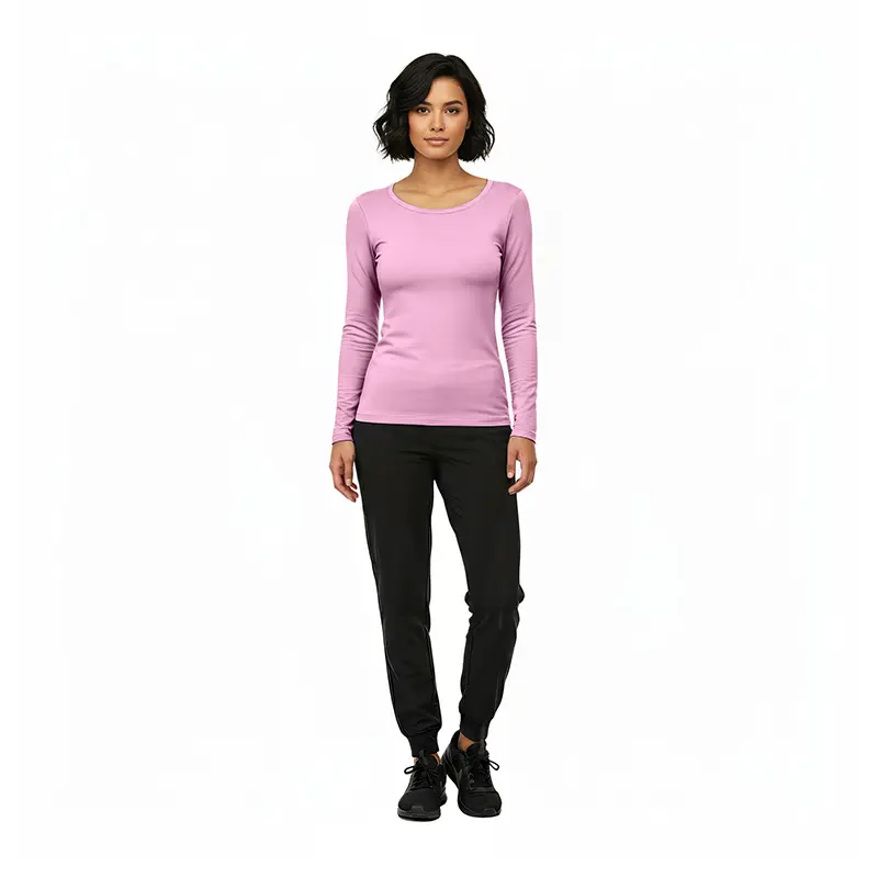 Wholesale women's pink long-sleeve crew neck top with black jogger pants and black lace-up shoes