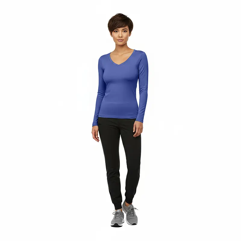 Wholesale women's blue long-sleeve v-neck top with black joggers and gray sneakers
