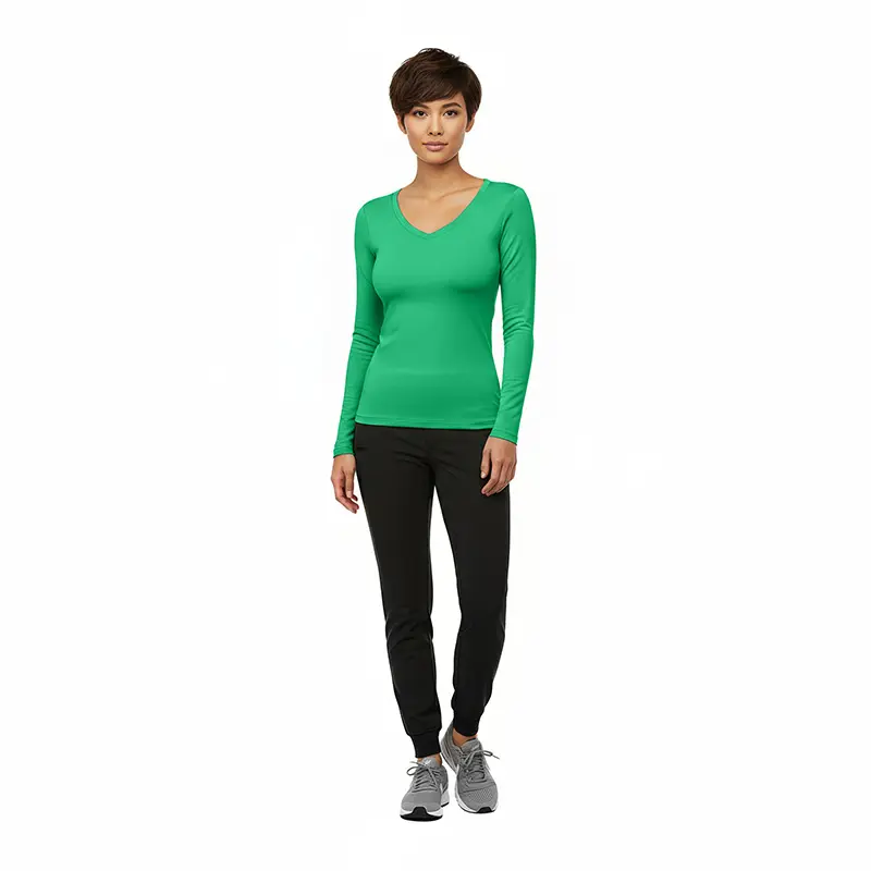 Wholesale women's green long-sleeve v-neck top with black jogger pants and gray sneakers