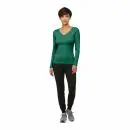 Wholesale women's green long sleeve v-neck top with black jogger pants and gray sneakers