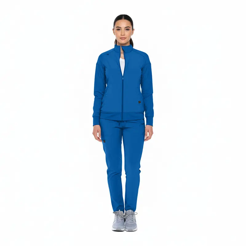 Wholesale women's blue zip-up track jacket and matching jogger pants set with white sneakers