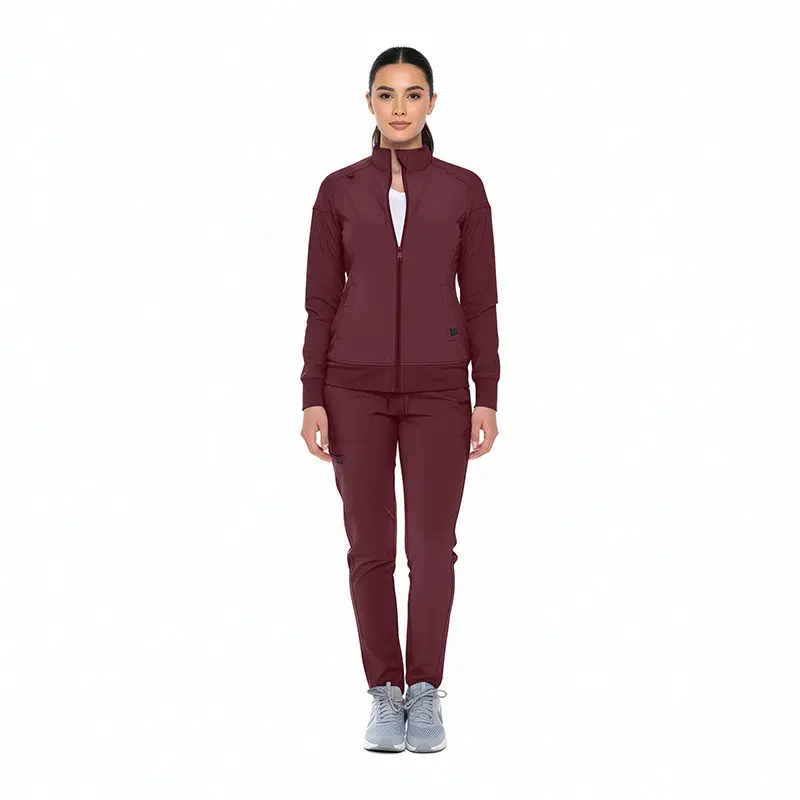 Wholesale women's burgundy zip-up track jacket and matching tapered pants set with white sneakers