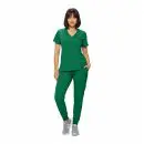 Wholesale women's green v-neck scrub top and jogger pants set with chest pocket and gray sneakers
