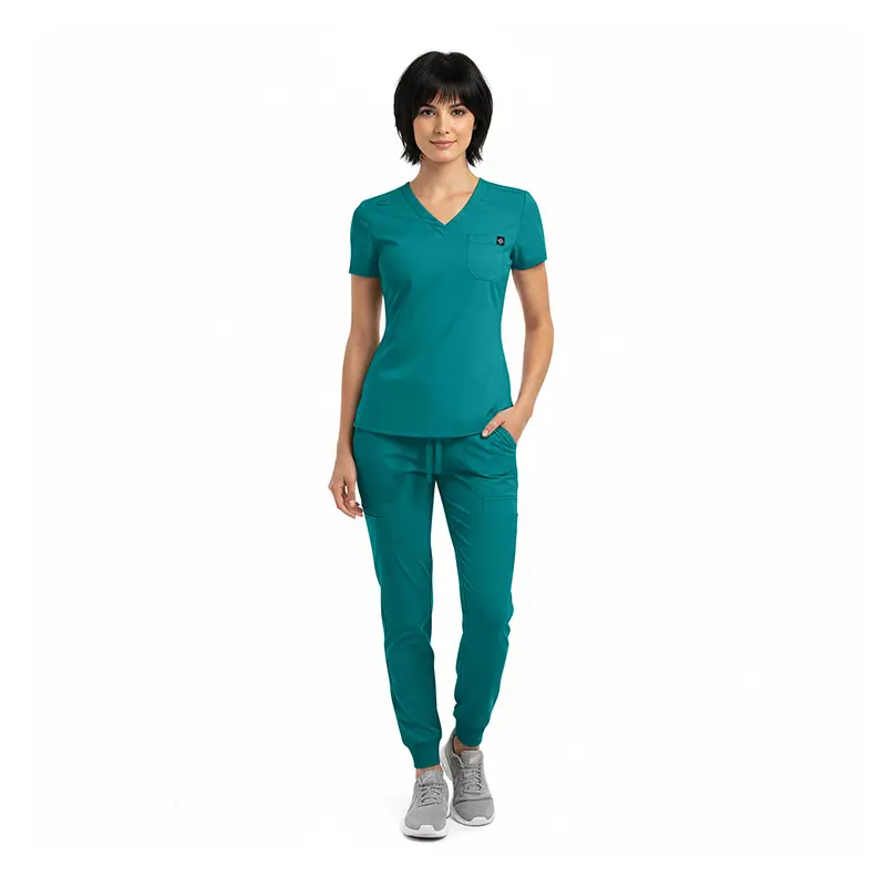 Wholesale women's teal scrub set with v-neck top and jogger pants with gray sneakers