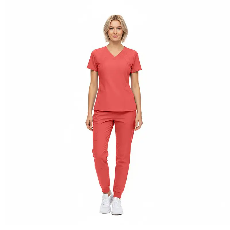 Wholesale women's coral v-neck scrub top and jogger pants set with white sneakers