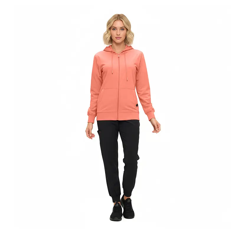 Wholesale women's coral zip-up hoodie with black jogger pants and black lace-up shoes