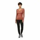 Wholesale women's rust v-neck long-sleeve top with black jogger pants and gray sneakers