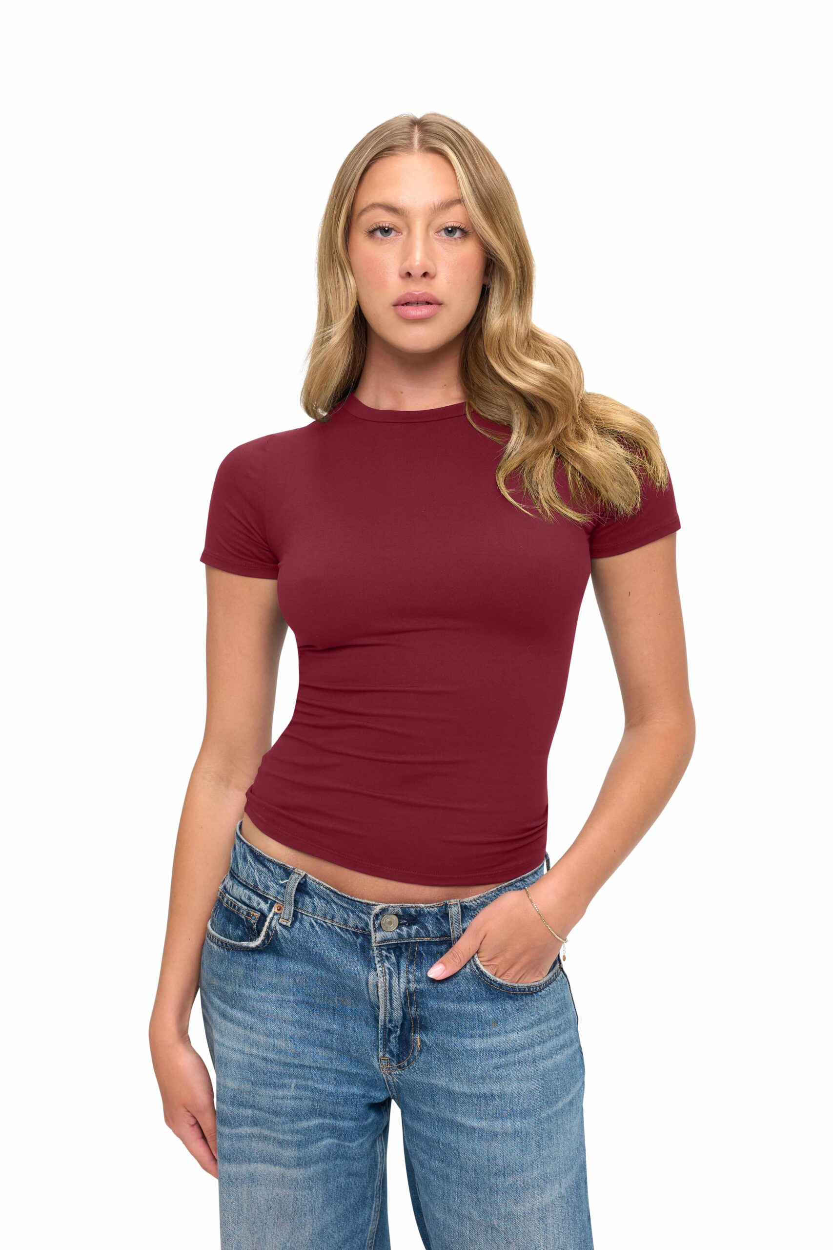 Wholesale women's maroon short-sleeve crew neck fitted t-shirt paired with blue denim jeans